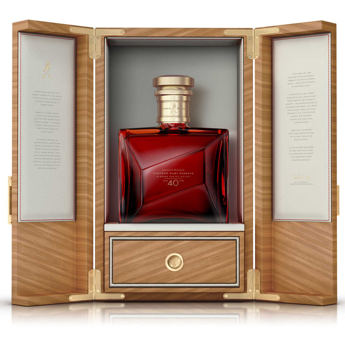 A bottle of Johnnie Walker Master's Ruby Reserve 40 Year Old, Blended Scotch Whisky in opened box