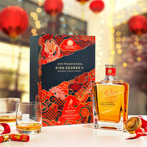 An opened bottle of John Walker & Sons King George V Limited Edition with box in Chinese New Year decoration