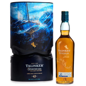 A bottle of Talisker Xpedition Oak 43 Year Old with box against clean white background