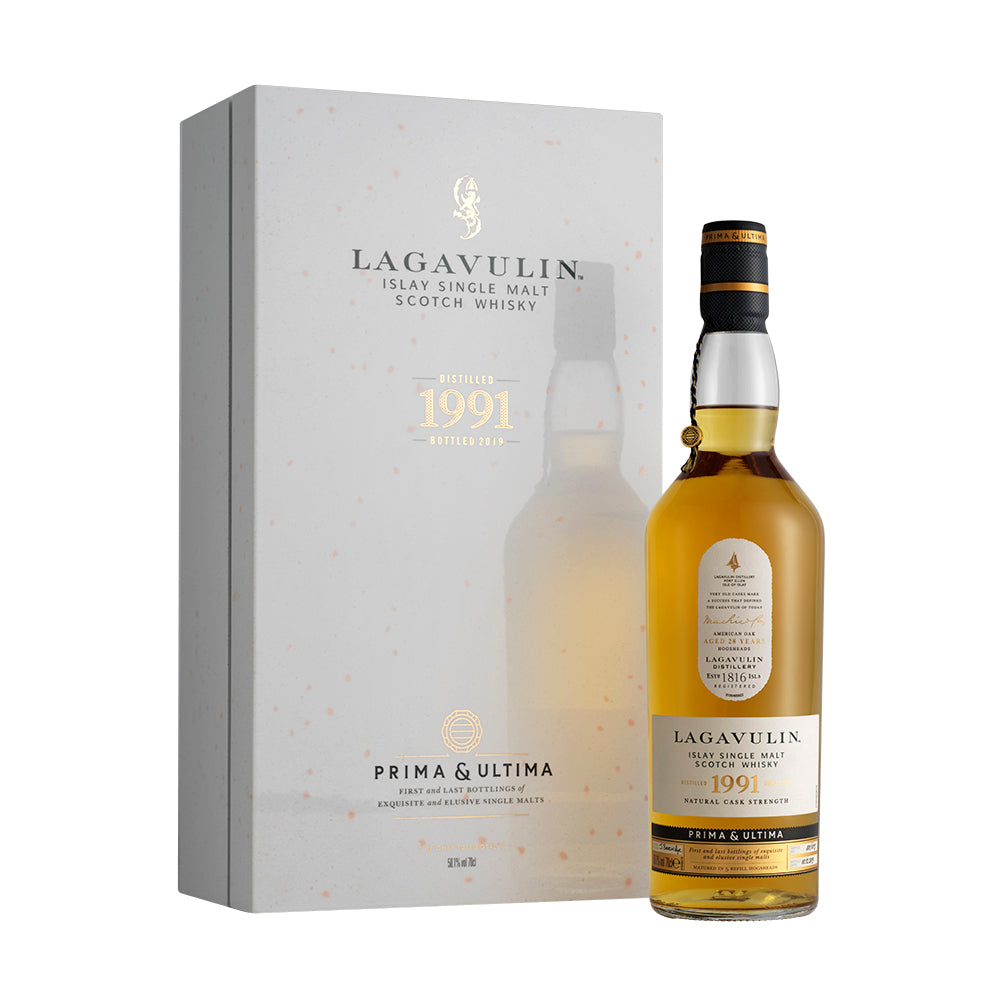 A bottle of Lagavulin 1991 - Prima & Ultima, 28 Year Old Islay Single Malt Whisky with box against white background