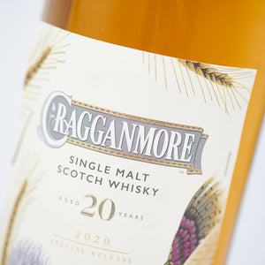 A close up of Cragganmore 20 Year Old Special Release 2020 Single Malt Scotch Whisky bottle against a white background