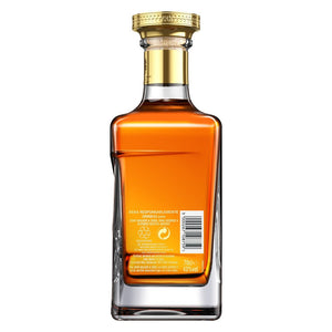 Back view of a bottle of John Walker & Sons King George V, Blended Scotch Whisky against white background
