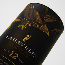 Load image into Gallery viewer, Closeup of Lagavulin 12 Year Old Special Release 2019, Islay Single Malt Whisky box design detail against white background
