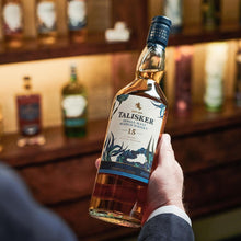 Load image into Gallery viewer, A bottle of Talisker 15 Year Old Special Release 2019, Single Malt Scotch Whisky held in hand
